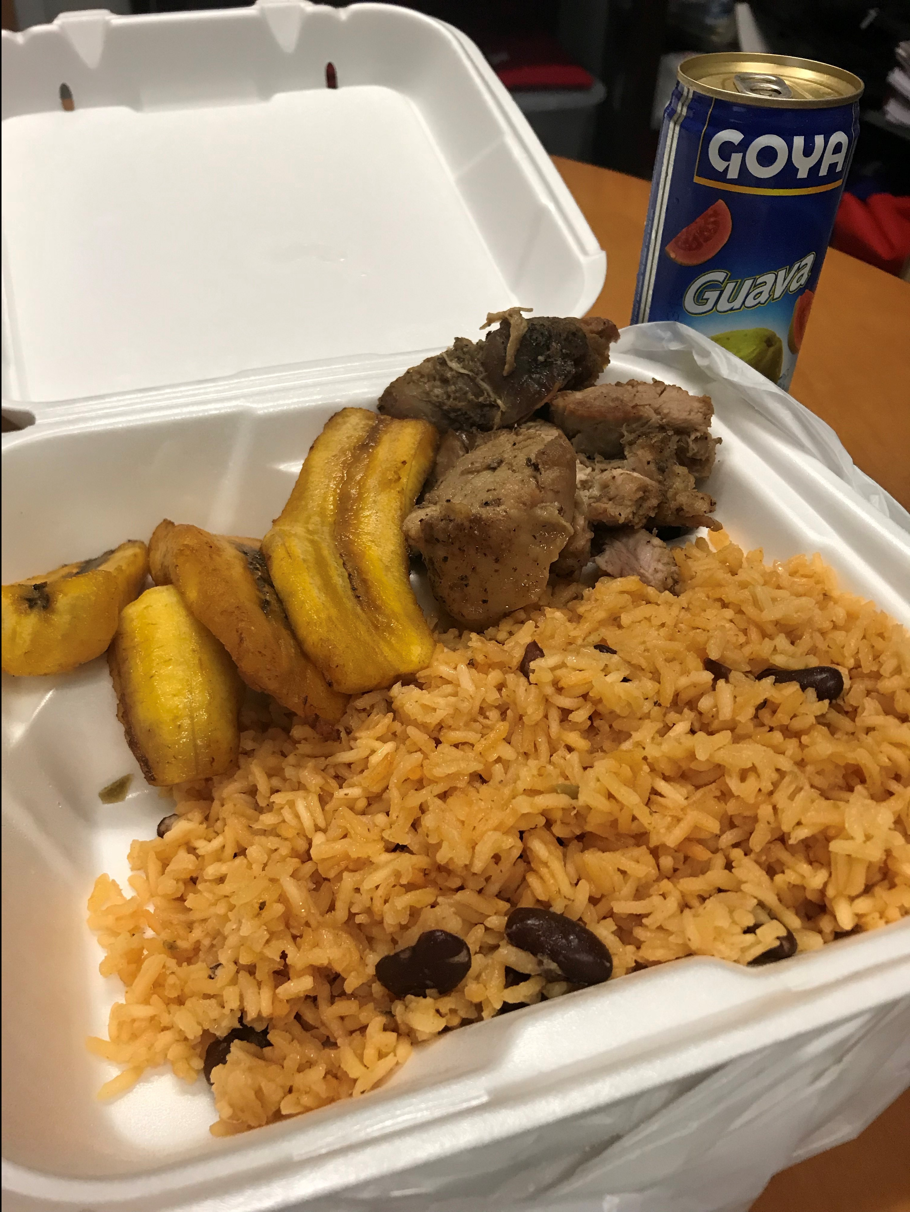 Pernil platter with maduros and yellow rice